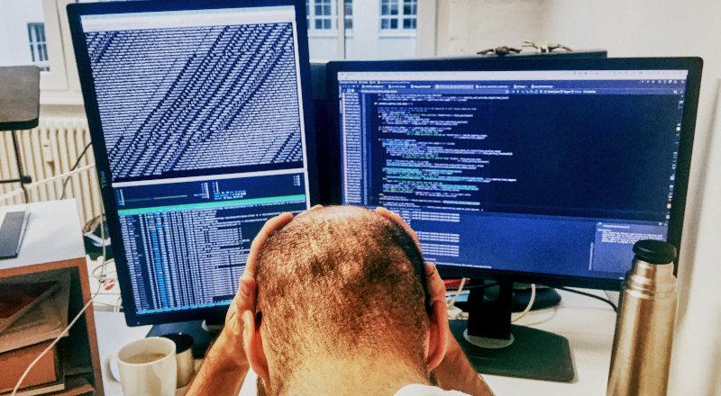 Developer programmer frustrated with computer crash. Developer programmer frustrated with computer crash.